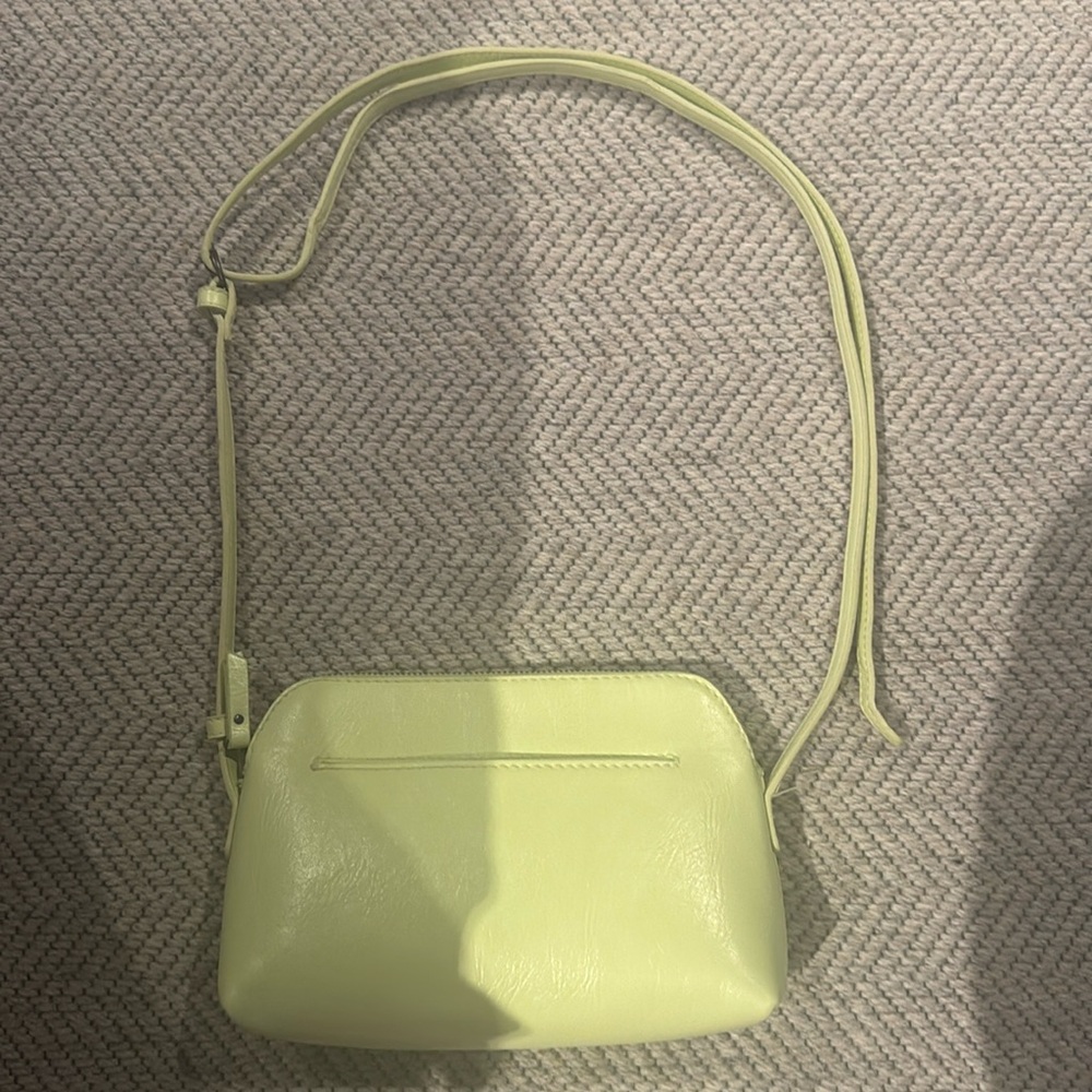 Mint green bag
You can loosen it or tighten it in great shape never been used